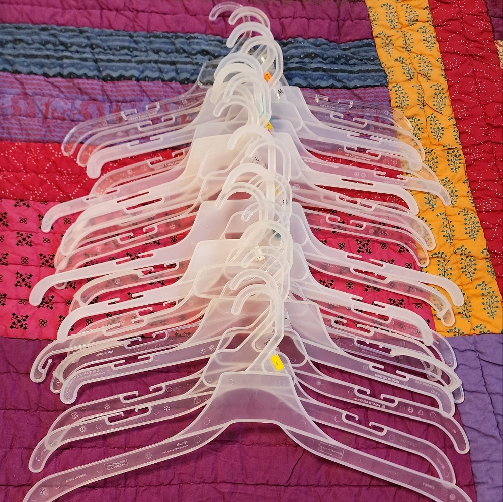 Lot of 19 clear plastic hangers